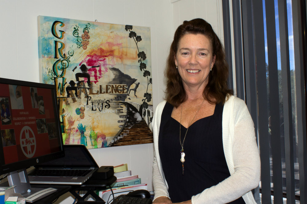 Woman at stand up desk