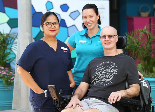 Photo of staff with spinal patient