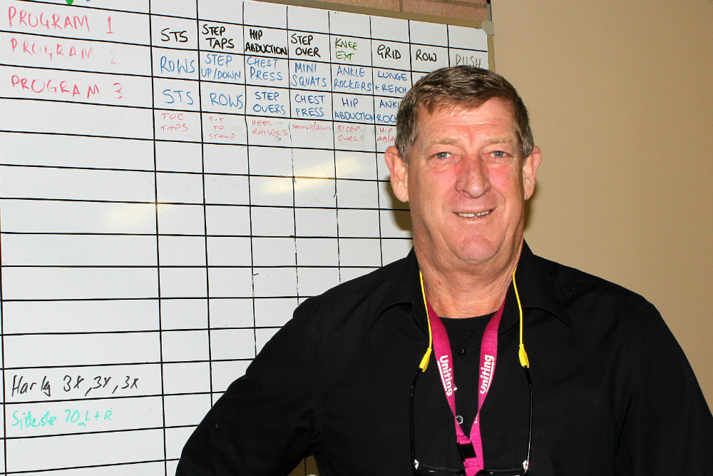 Gentleman in front of whiteboard