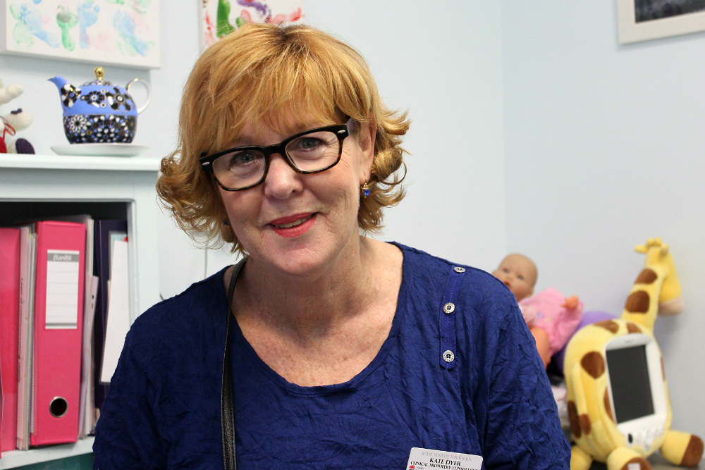 Smiling lady with red hair