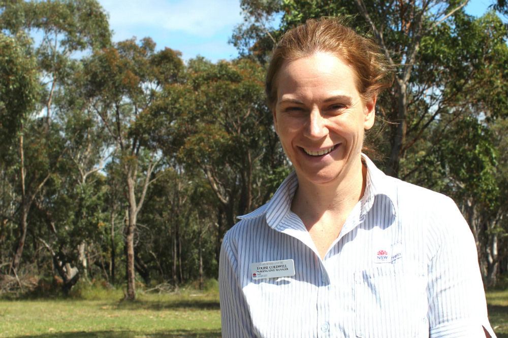 Smiling woman in the outdoors