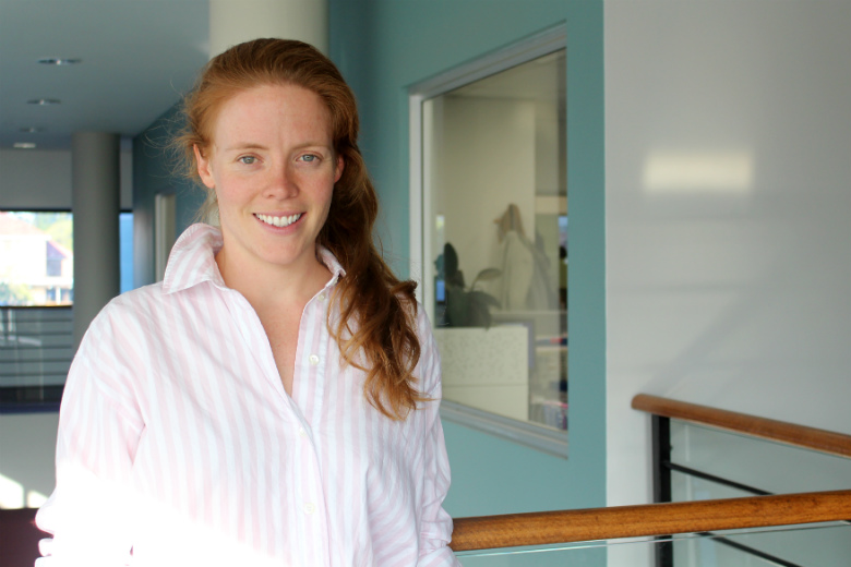 Red headed woman on balcony