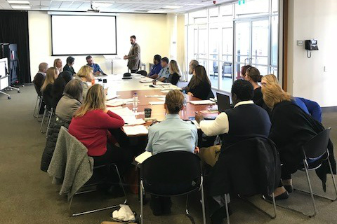 Group of people around a conference table