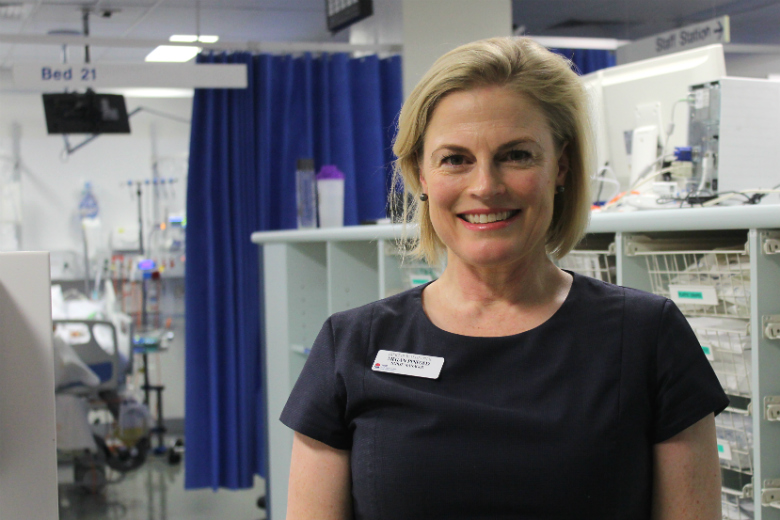 Woman in hospital ward setting