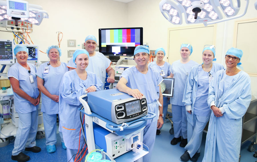Theatre staff wearing scrubs
