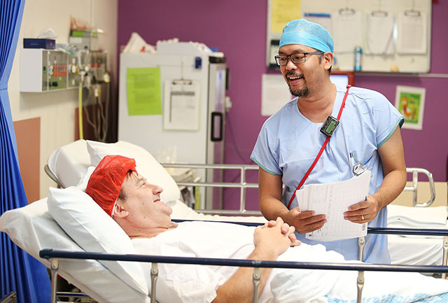 Nurse looking after patient