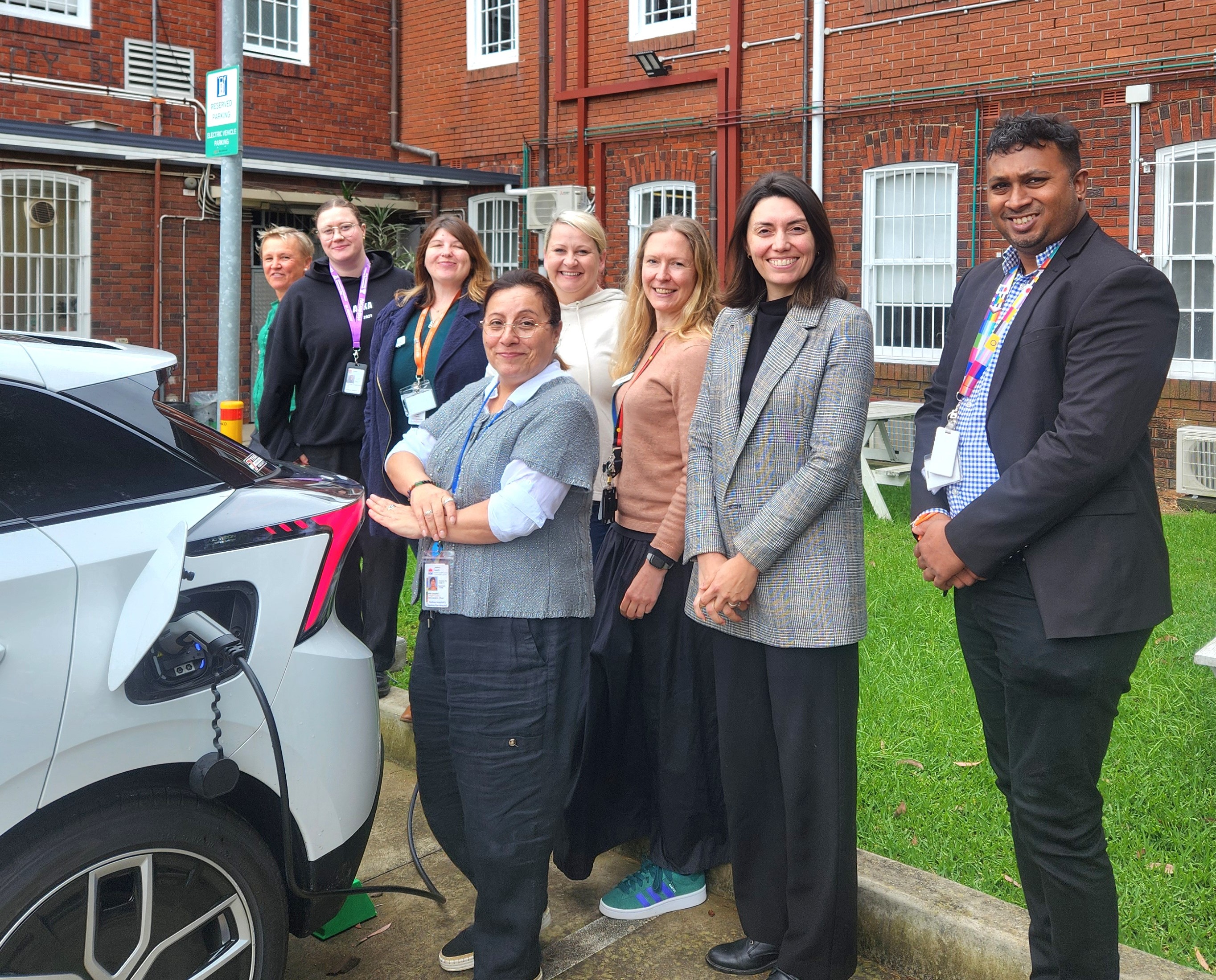 Langton Centre staff with their new electric vehicle