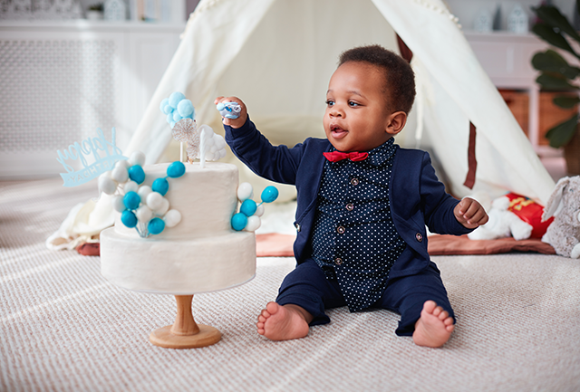 Baby with Birthday Cake