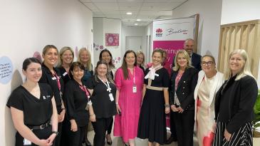 Large group of health professionals in new BreastScreen Clinic